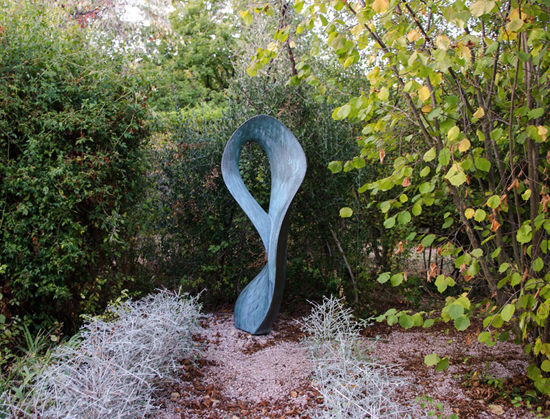 Garden sculpture the swirl in bronze by Ben Barrell